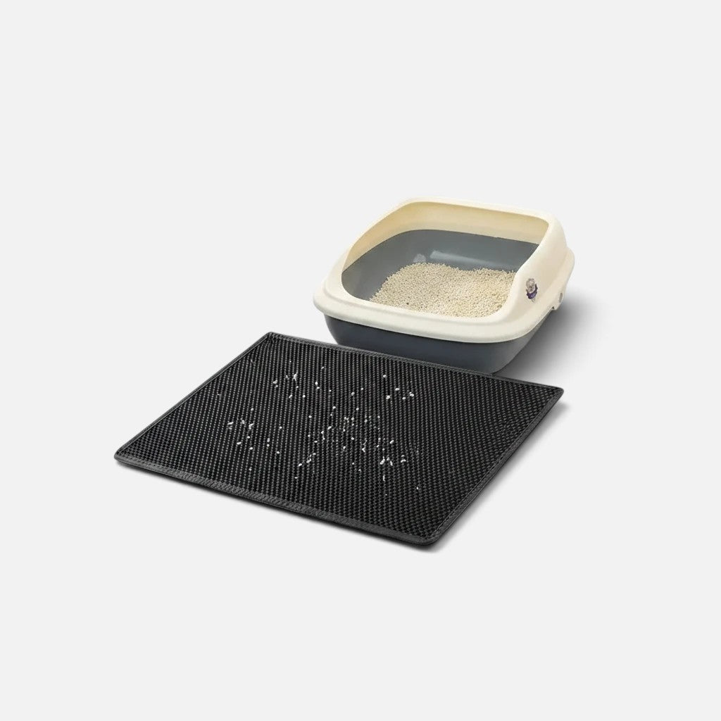 Tailora black honeycomb double-layer cat litter mat placed in front of a litter box to trap scattered granules