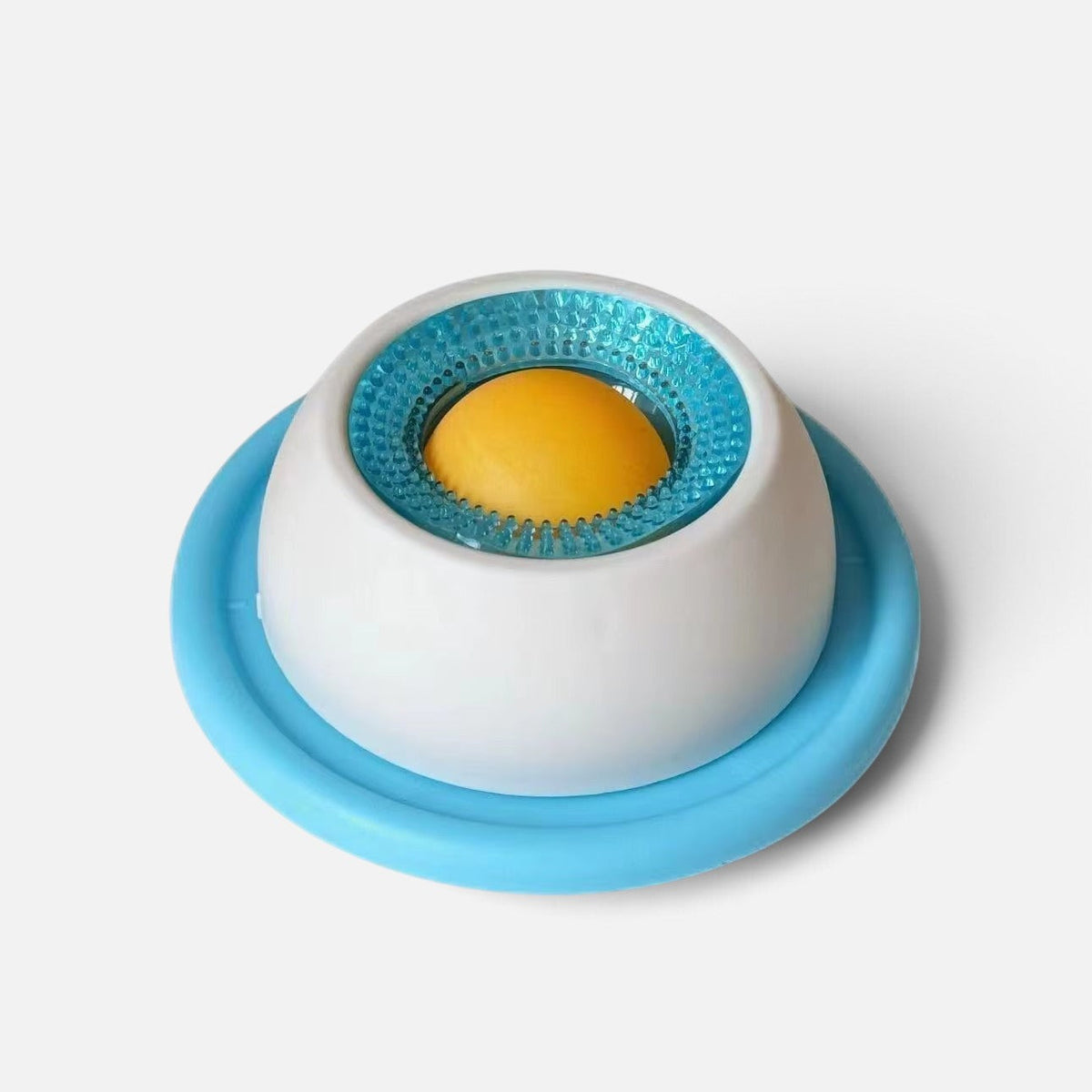 Tailora calming slow feeder mat for pets with a white base, blue textured rim, and yellow center for treats.