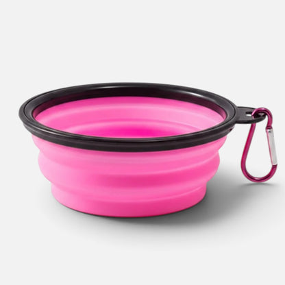 Tailora collapsible pink silicone pet travel bowl with a black rim and attached metal carabiner for easy carrying.