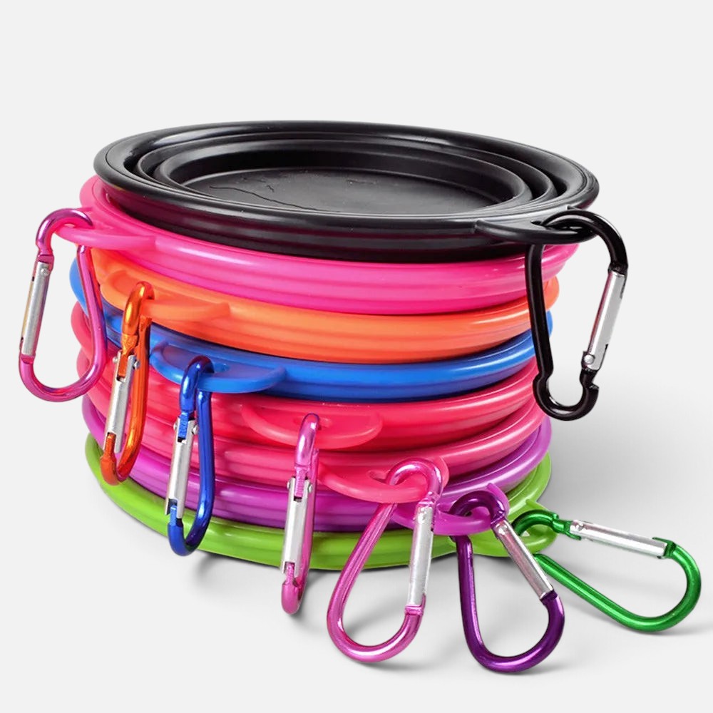 Tailora collapsible silicone pet travel bowls in assorted bright colors stacked with attached metal carabiner clips.
