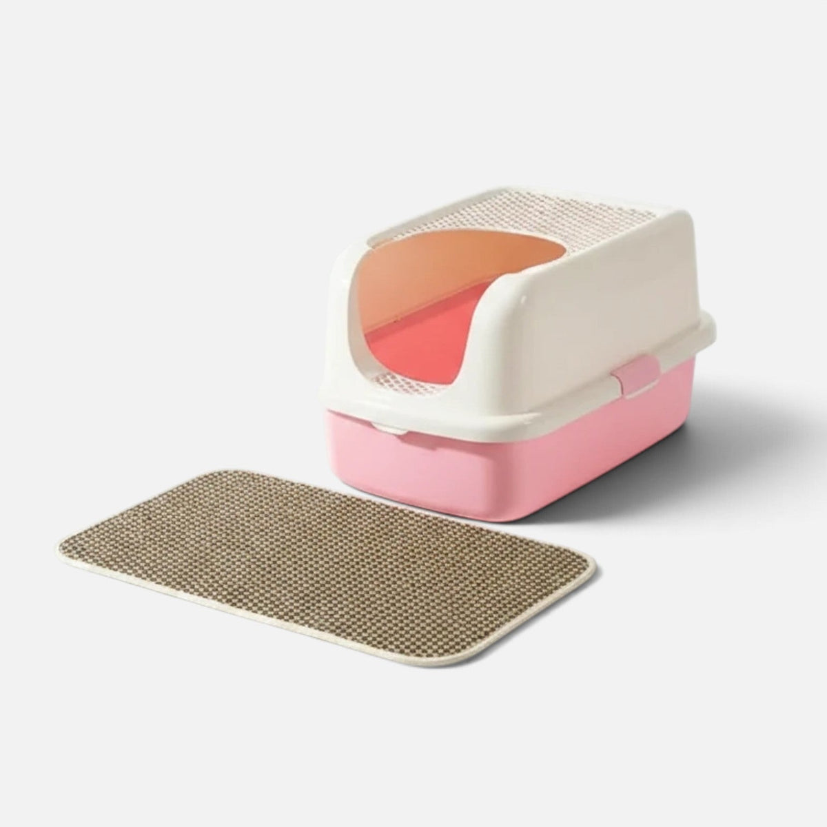 Tailora double-layer honeycomb cat litter mat in brown placed next to a pink and white hooded litter box
