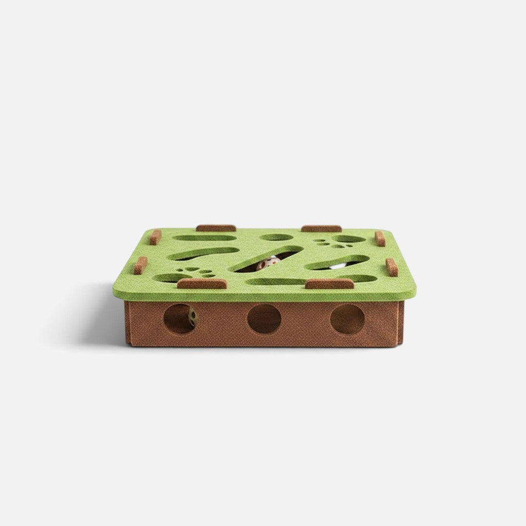 Tailora interactive cat puzzle box made of green and brown scratch-resistant felt with peek-a-boo cutouts.