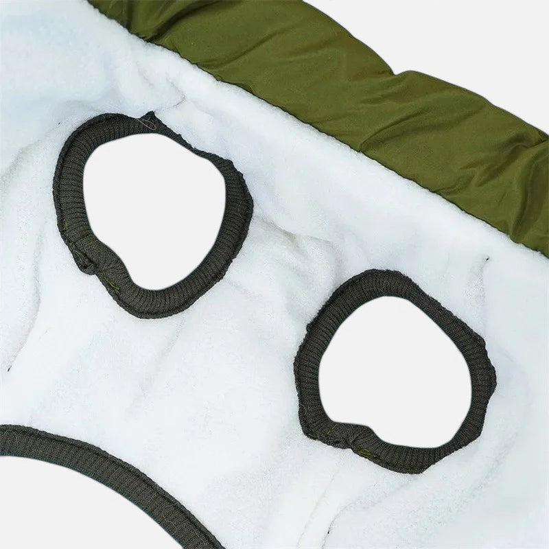 Tailora winter dog jacket interior showing soft white fleece lining and olive green waterproof outer shell
