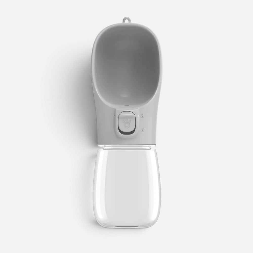 Tailora grey leak-proof portable pet water bottle with a built-in drinking trough and one-hand lock button