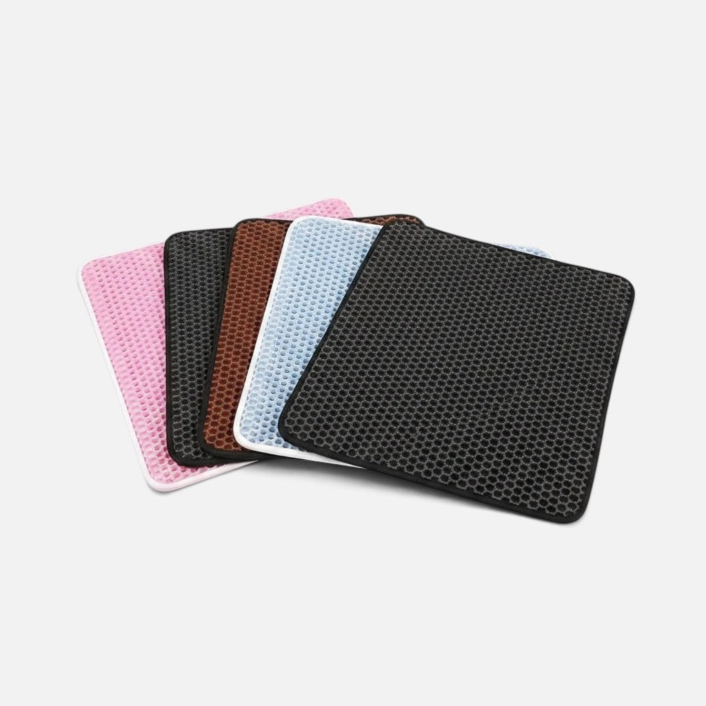 Tailora double-layer honeycomb cat litter mats in various colors including black, blue, brown, and pink.