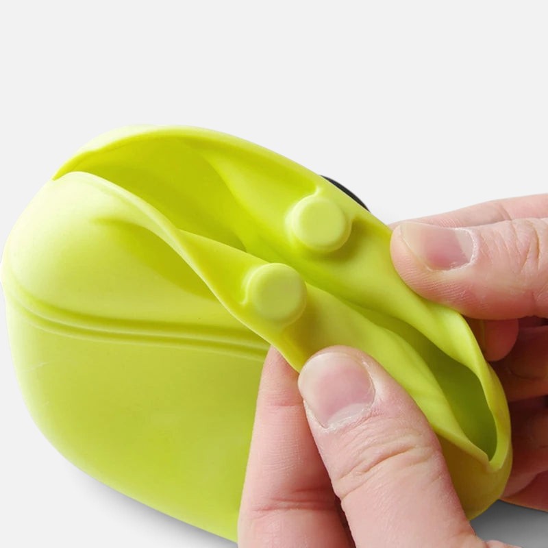 Tailora hands-free dog training pouch in lime green silicone with a magnetic closure for easy treat access