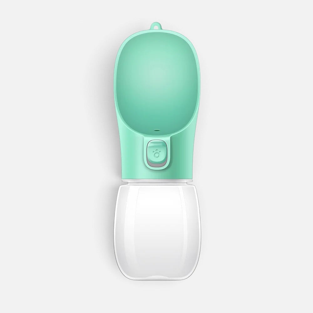 Tailora leak-proof portable dog water bottle in mint green with a built-in drinking trough and one-hand lock button.