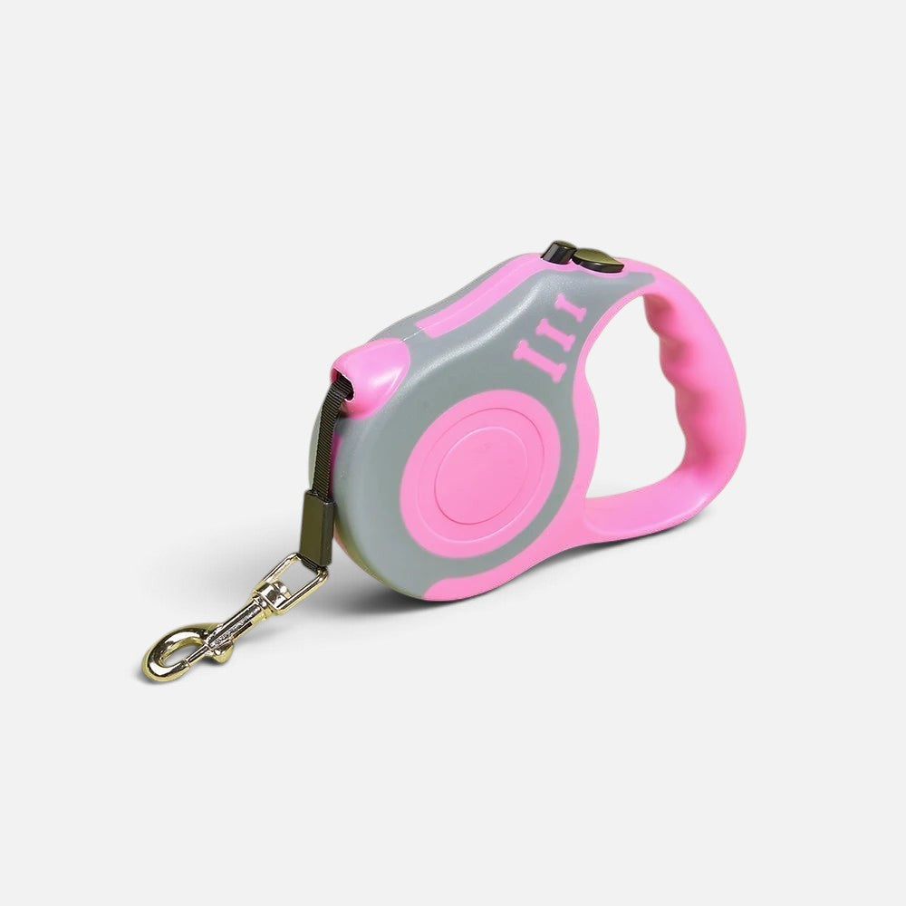 Tailora automatic retractable dog leash in pink and grey with an ergonomic handle and metal swivel hook