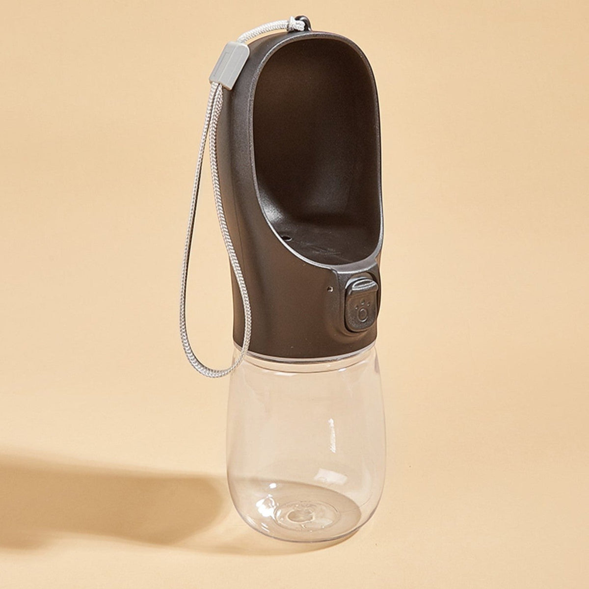 Tailora leak-proof portable dog water bottle with a dark grey trough, clear reservoir, and carrying lanyard.