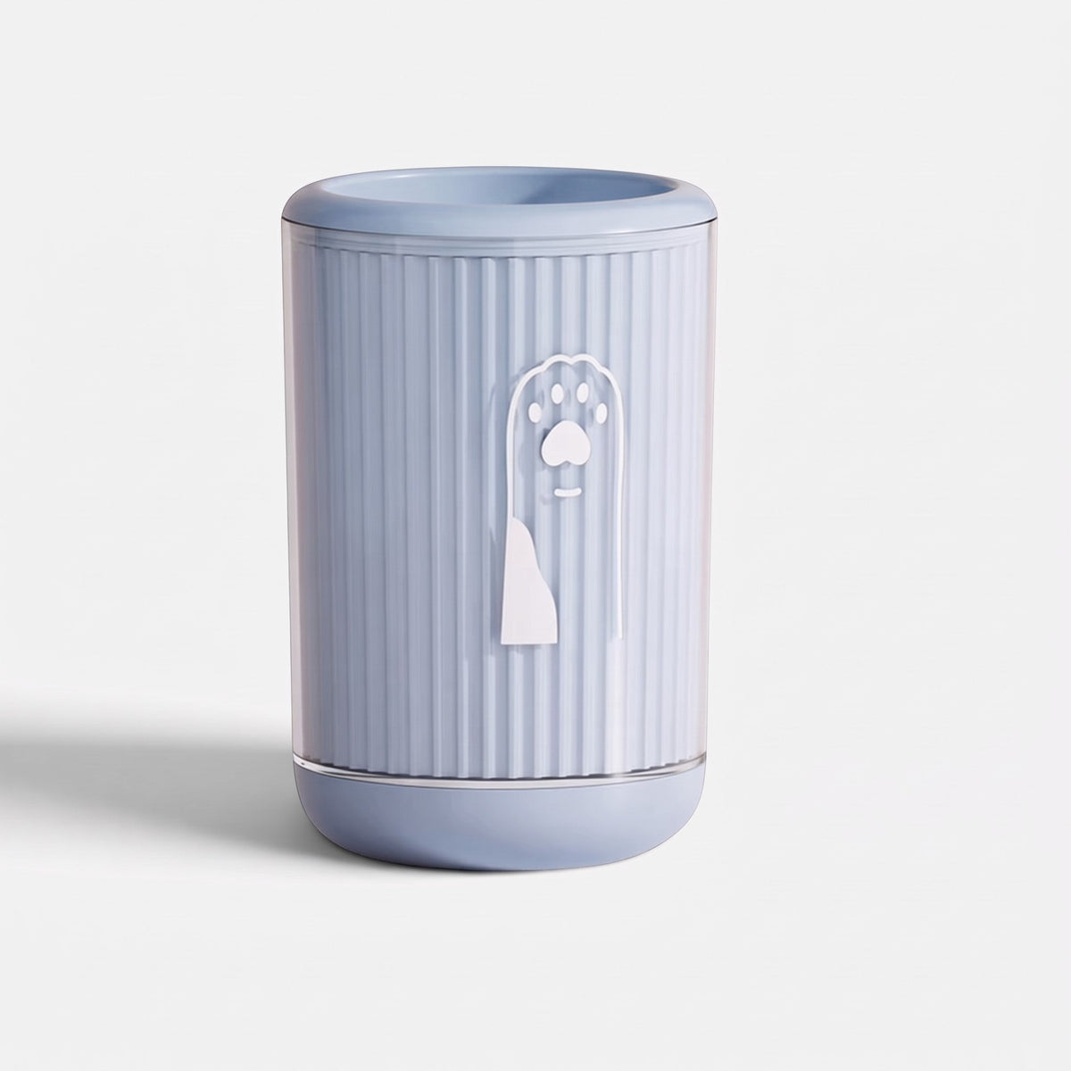 Tailora portable paw washer cup in light blue with a ribbed design and a cute paw print icon on the front
