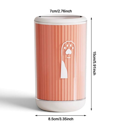 Tailora portable paw washer cup in peach with white trim and a paw print icon, featuring soft internal bristles.