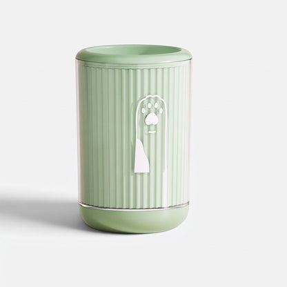 Tailora portable paw washer cup in light green with a white paw print icon and ribbed silicone texture