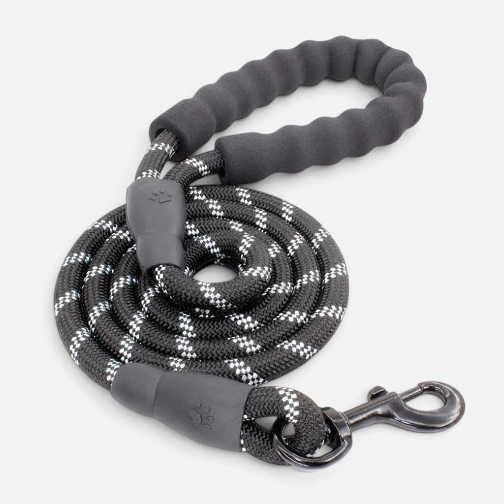 Tailora black and white reflective dog leash with a soft neoprene padded handle and heavy-duty metal clasp.