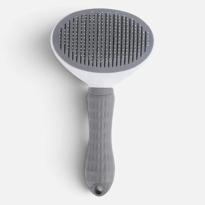 Tailora self-cleaning slicker brush with grey ergonomic handle and stainless steel bristles for dogs and cats