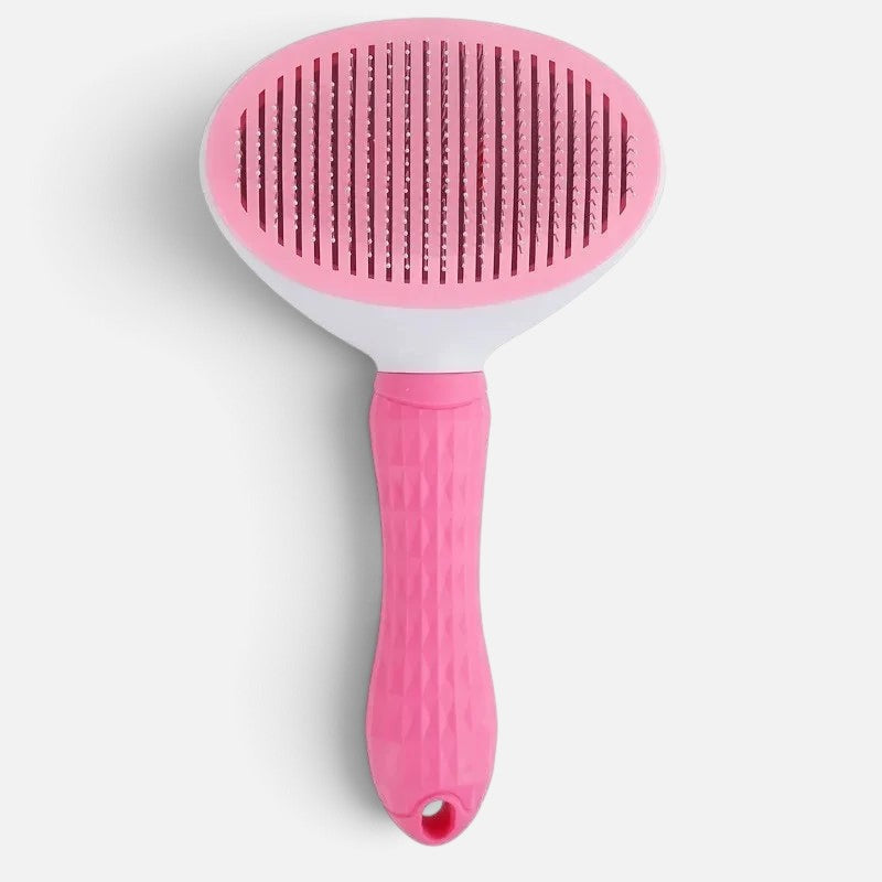 Tailora self-cleaning slicker brush with a pink ergonomic handle and stainless steel bristles for dogs and cats