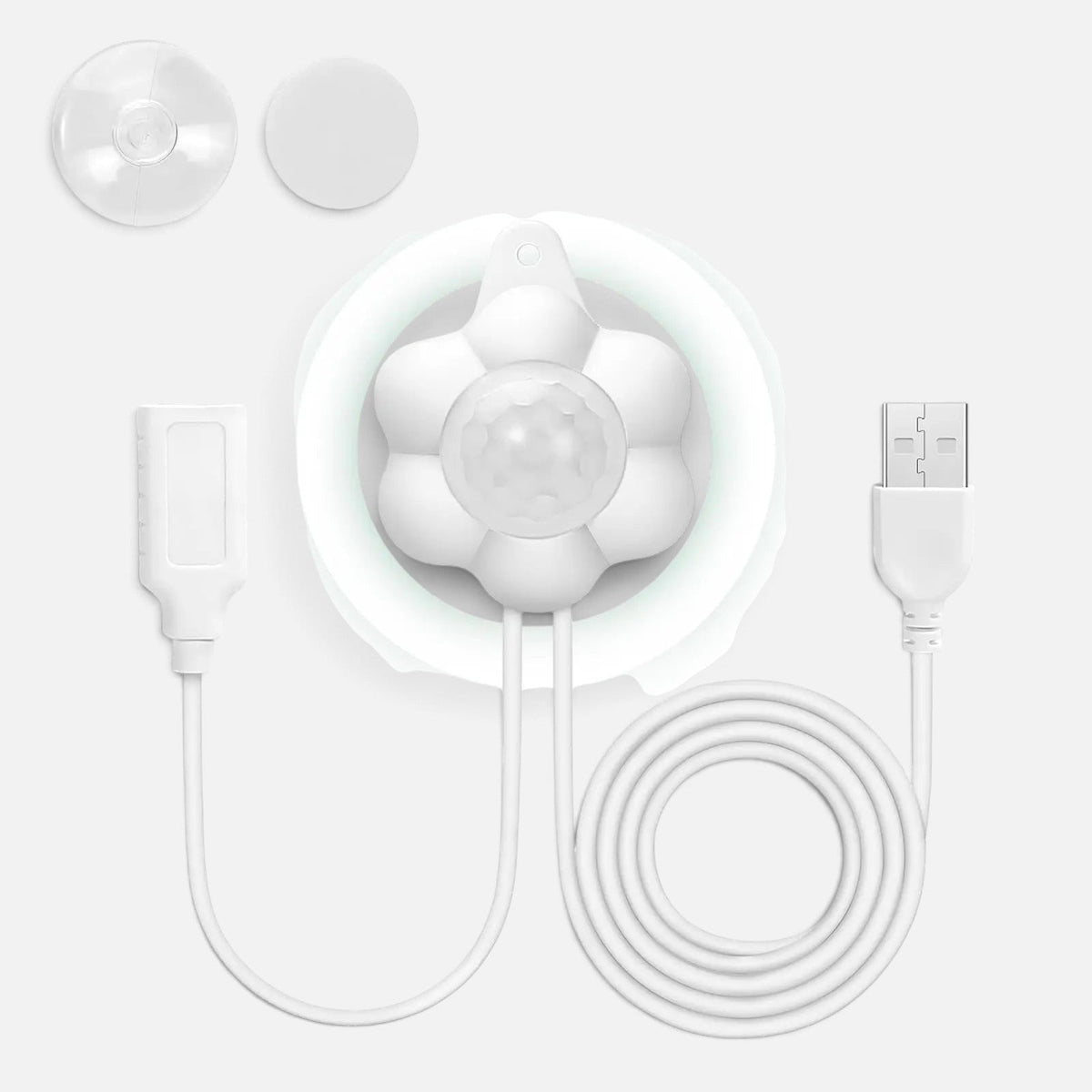 Tailora smart motion sensor accessory with white flower-shaped design, USB cable, and suction cup for pet fountain