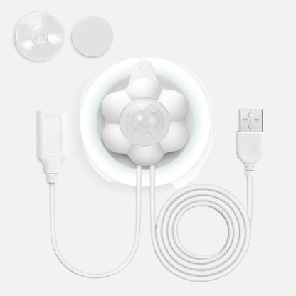 Tailora smart motion sensor accessory with white flower-shaped design, USB cable, and suction cup for pet fountain